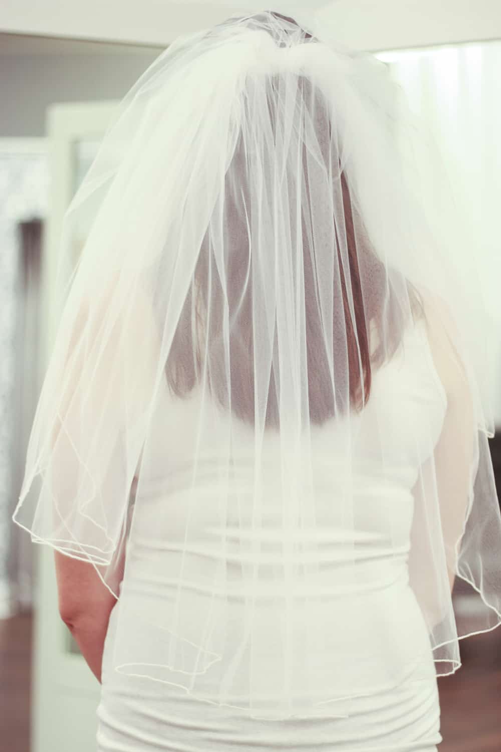 A Bride's Guide to Types of Wedding Veils: Elbow Length Wedding Veil Style