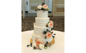 Edible Art Raleigh NC 4 tier- off white cake with pink and white flowers