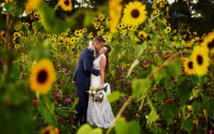 Azul Photography Raleigh NC Forever & Company couple surrounded by sunflowers