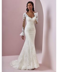 Bride wearing long sleeve lace wedding gown - Simply Blush Bridal - Forever Bridal Wedding Shows