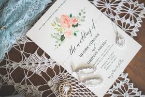 Will Greene Photography - Wedding Invitation with jewelry flat flay - Forever Bridal Wedding Shows