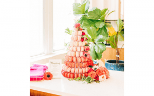 Mon Macaron pink and orange tiered cake with florals