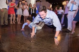 Dow Oak Events photo of two guys doing the worm on the dance floor