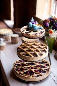 Three different blueberry pies stacked