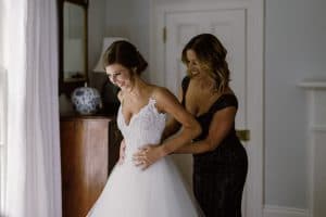 Bride and Mother of the Bride getting ready before the wedding ceremony - Autumn Harrison Photography - Forever Bridal Wedding Shows