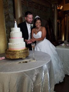 Couple cutting wedding cake - confectionate cakes - forever bridal wedding shows