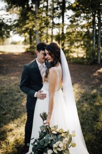 I Do Weddings by Michelle - Amanda Sutton Photography - briide and groom hugging - Forever Bridal Wedding Shows