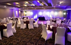 double tree brownstone indoors reception with blue and purple lights