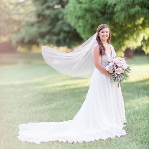 Bride in Field wear a gown from Simply Blush bridals