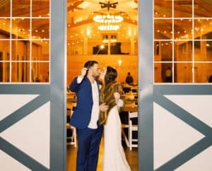 Lily Rose Events couple enjoying barn wedding with sparklers