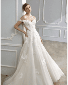 Sinderellas Rockefellas Bridal Boutique Southport NC model in flowery gown