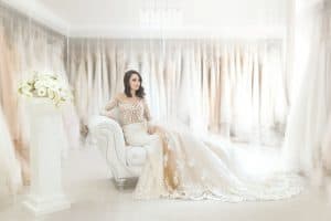 Forever & Company Blog Image bride sitting in bridal boutique