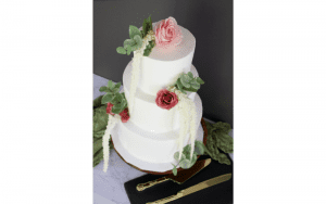 Banko Bake 3 tiered white cake with red and pink flowers