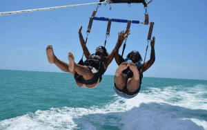 Bucket List Moments Travel 2 women parasailing