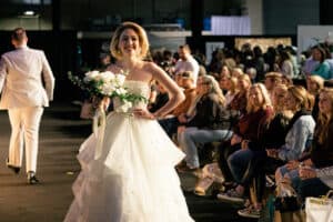Model in wedding gown at wedding show