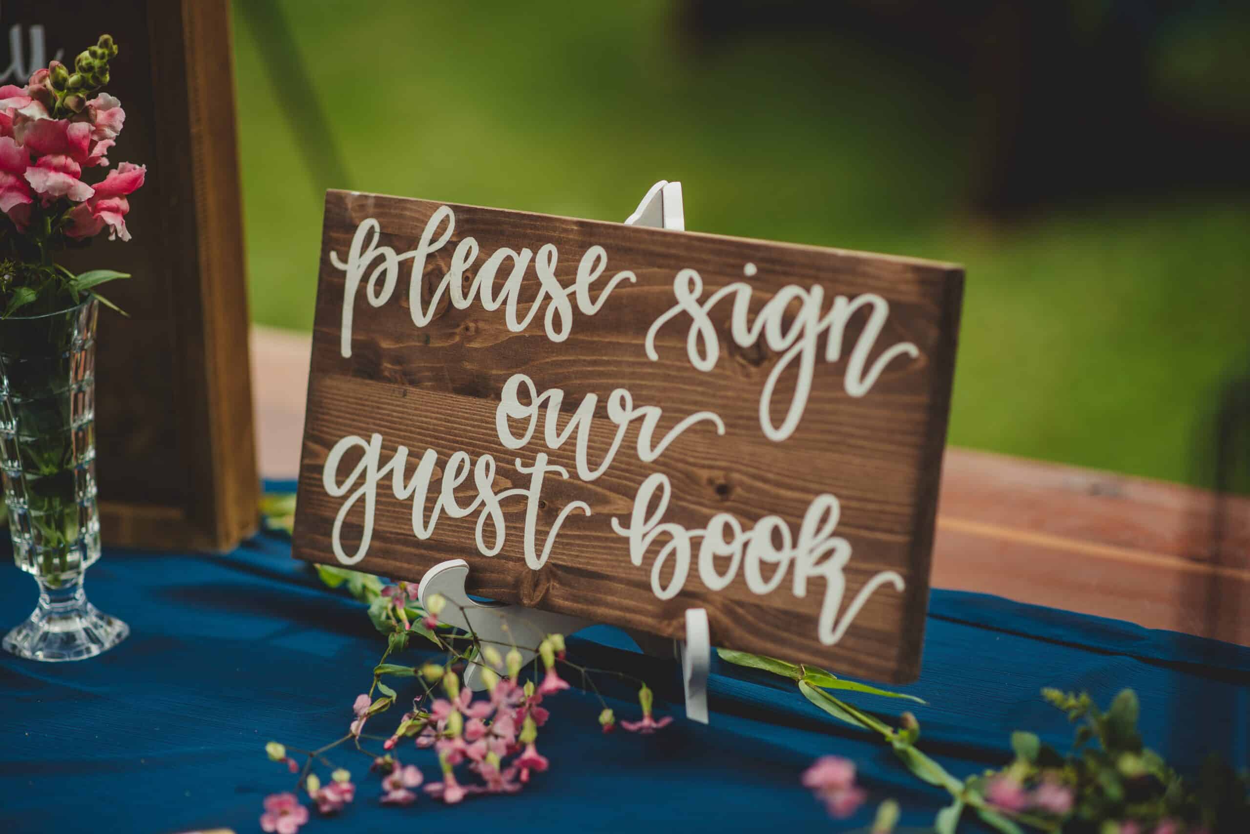 "Please sign our guest book" wooden wedding decor sign